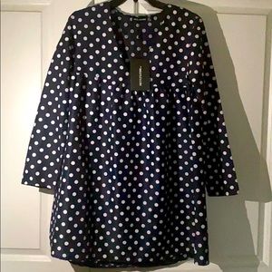 Navy blue and white polka dot swing dress